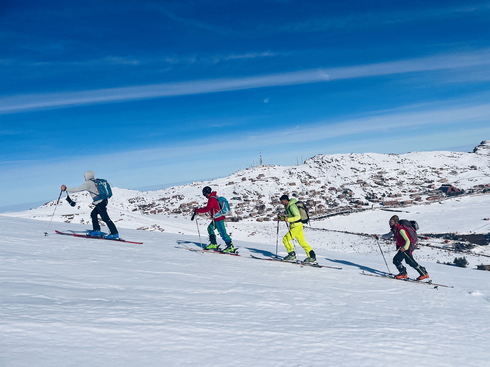 Ski touring adventure on the snowy slopes of Tizi Likemt in Morocco's High Atlas Mountains